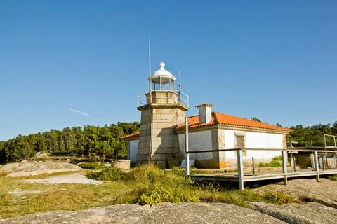 Lighthouse in punta cabalo, isla de arousa, galicia, spain Stock Photos
