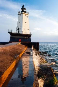 Lighthouse Reflections and Splashes Stock Photos