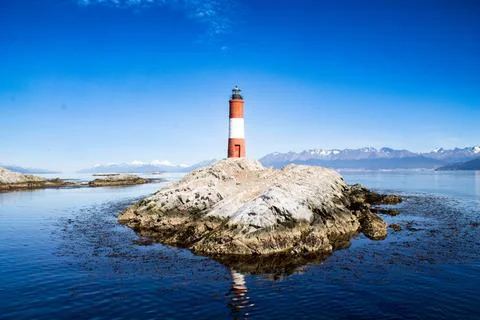 Lighthouse on the rock Stock Photos