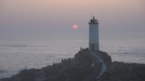 Lighthouse Roncudo at sunset. Spain 스톡 동영상 87655406