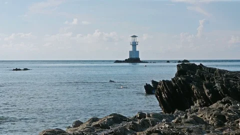 Lighthouse in the sea Stock Footage 90060639