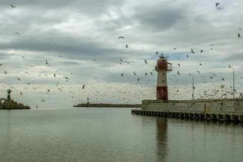 Lighthouse at sea Stock Photos