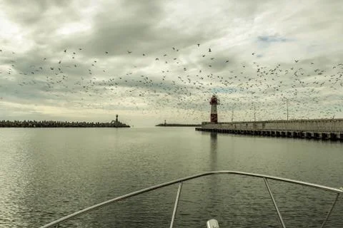 Lighthouse at sea Stock Photos