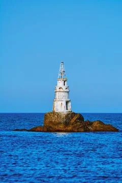 Lighthouse in Sea Stock Photos