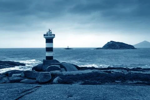 Lighthouse by the sea Foto stock