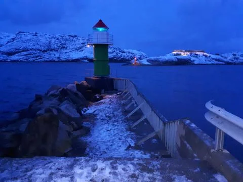 Lighthouse by the sea Stock Photos