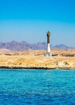 Lighthouse on the sea Stock Photos