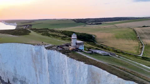 Lighthouse On SevenSisters Cliffs Aerial Stock Footage 344058743