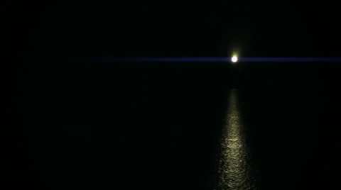 Lighthouse Shines Light at Night - 29,97FPS NTSC Stock Footage 55238313