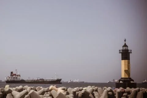 Lighthouse on the shore. Stock Photos