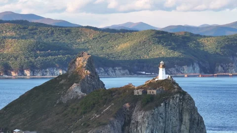 Lighthouse on a Small Island in the Middle of the Ocean Stock Footage 265791607