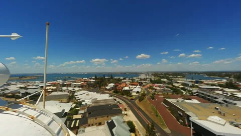Lighthouse in a small town by the beach in Australia Stock Footage 243728351