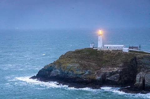 A lighthouse on South Stack, an island situated just off Holy Island on the n Stock Photos