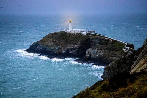 A lighthouse on South Stack, an island situated just off Holy Island on the n Stock Photos