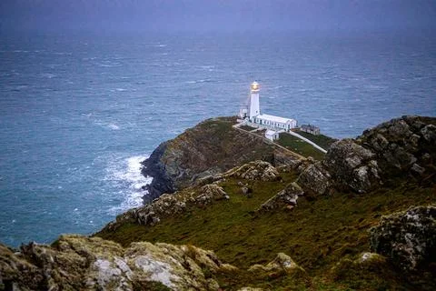A lighthouse on South Stack, an island situated just off Holy Island on the n Stock Photos