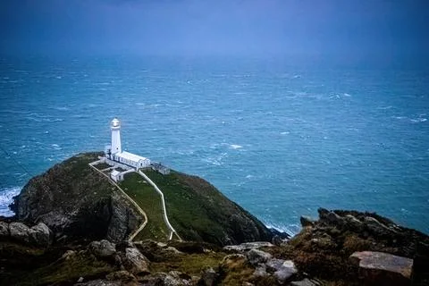 A lighthouse on South Stack, an island situated just off Holy Island on the n Stock Photos