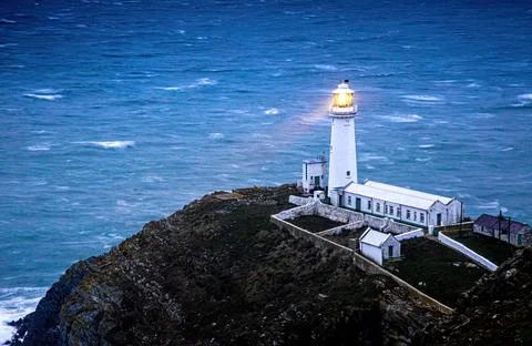 A lighthouse on South Stack, an island situated just off Holy Island on the n Stock Photos