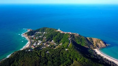 Lighthouse standing on a mountain above a small city in Australia Stock Footage 95898300