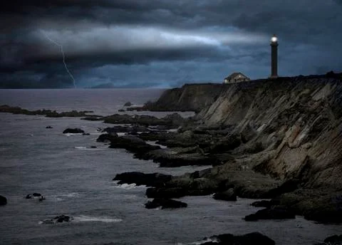Lighthouse at a storm 스톡 사진