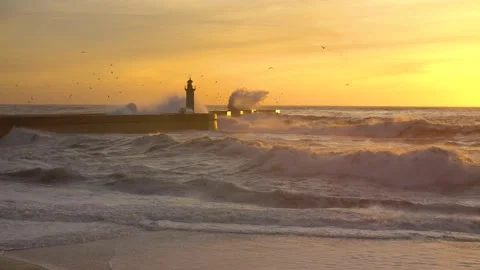Lighthouse In Stormy Landscape. Big Waves. Sunset.  Stock Footage 229532300