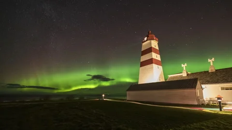 Lighthouse with a strong Aurora Borealis Stock Footage 250792776