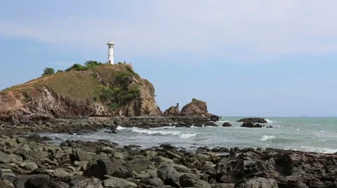 Lighthouse in strong sea wave. Stock Footage 64125888