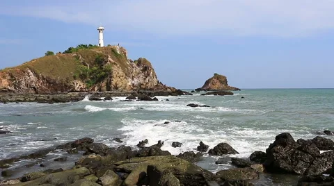 Lighthouse in strong sea wave. Stock Footage 64126007