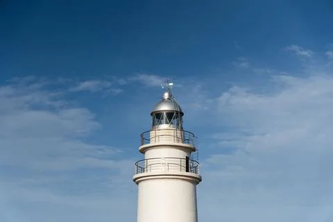 Lighthouse structure near the coast Stock Photos
