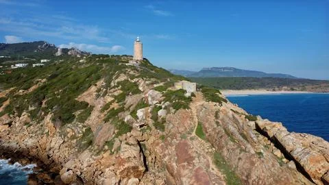 Lighthouse Summit: Drone's View of Coastal Beacon Stock Photos