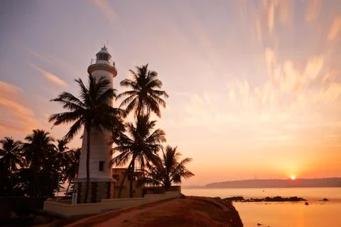Lighthouse at sunrise Fotos de archivo
