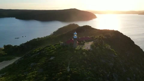 Lighthouse at sunset 4k drone footage 스톡 동영상 211289157