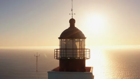 Lighthouse at sunset aerial Stock Footage 189987130