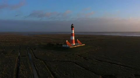Lighthouse at sunset, aerial panoramic view Stock Footage 123731442