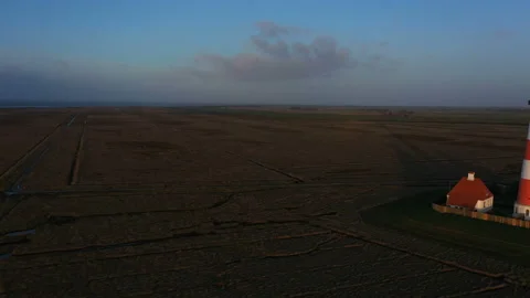 Lighthouse at sunset, aerial view Stock Footage 123732510