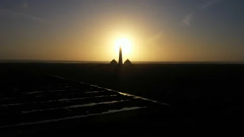 Lighthouse at sunset, aerial view, silhouette Stock Footage 123712299