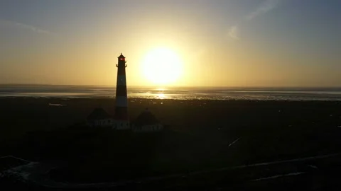 Lighthouse at sunset, aerial view, silhouette Stock Footage 123712604