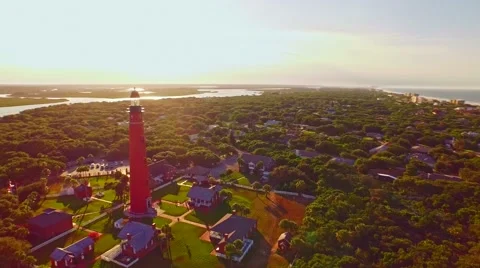 Lighthouse at sunset by Atlantic ocean Stock Footage 54940325