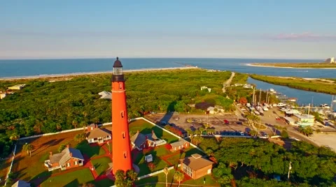 Lighthouse at sunset by Atlantic ocean Stock Footage 54940351