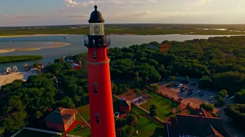 Lighthouse at sunset by Atlantic ocean Stock-Footage 54940360