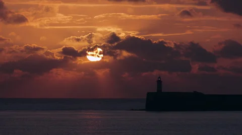 Lighthouse at sunset closer Stock Footage 43378628