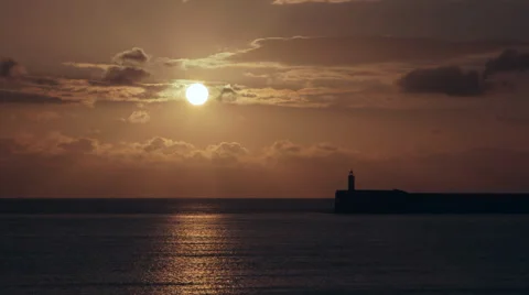 Lighthouse at sunset Stock Footage 43388480
