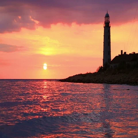 Lighthouse at sunset Stock Footage 69720034