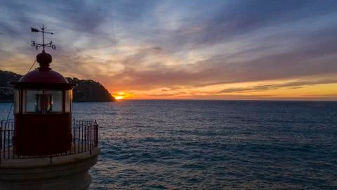 Lighthouse at sunset, Majorca, Spain Stock Photos
