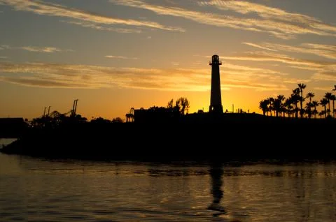 Lighthouse sunset Stock Photos