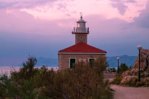 Lighthouse in sunset Stock Photos