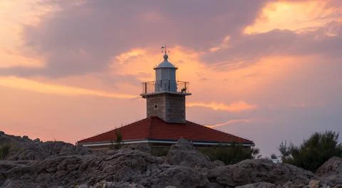 Lighthouse in sunset Stock Photos