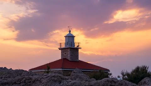 Lighthouse in sunset Stock Photos