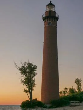 Lighthouse At Sunset Stock Photos