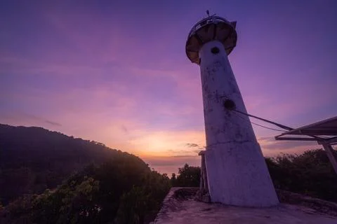 Lighthouse at Sunset. Stock Photos