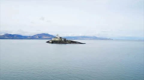 Lighthouse surrounded by ocean Stock Footage 62569084